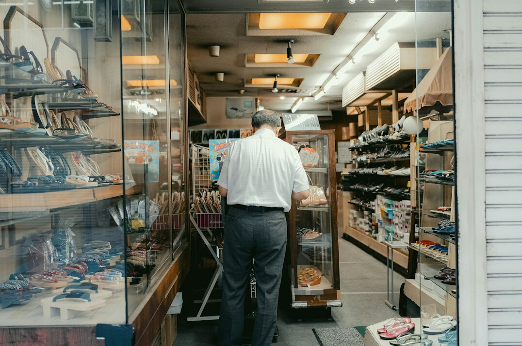 store detective watching customers