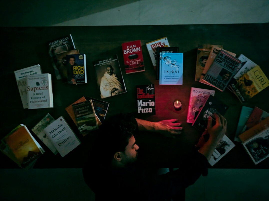Collection of books arranged on a table